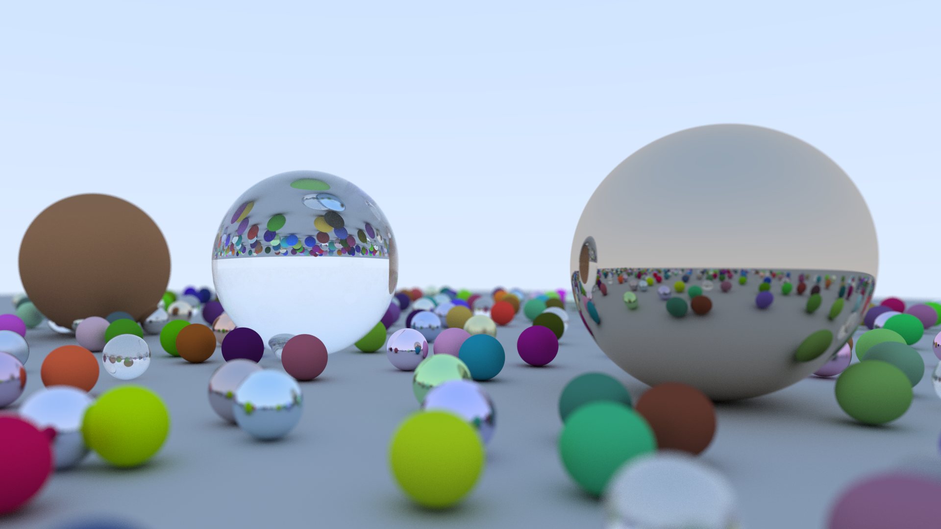 The final result. This scene contains three large spheres with different materials&mdash;lambertian, dielectric and metal. They are surrounded
by a lot of little spheres with various colors and materials.